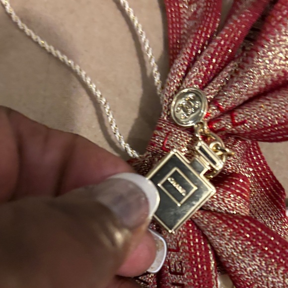 Chanel Red and Gold Ribbon with White Floral Accent - Picture 6 of 16